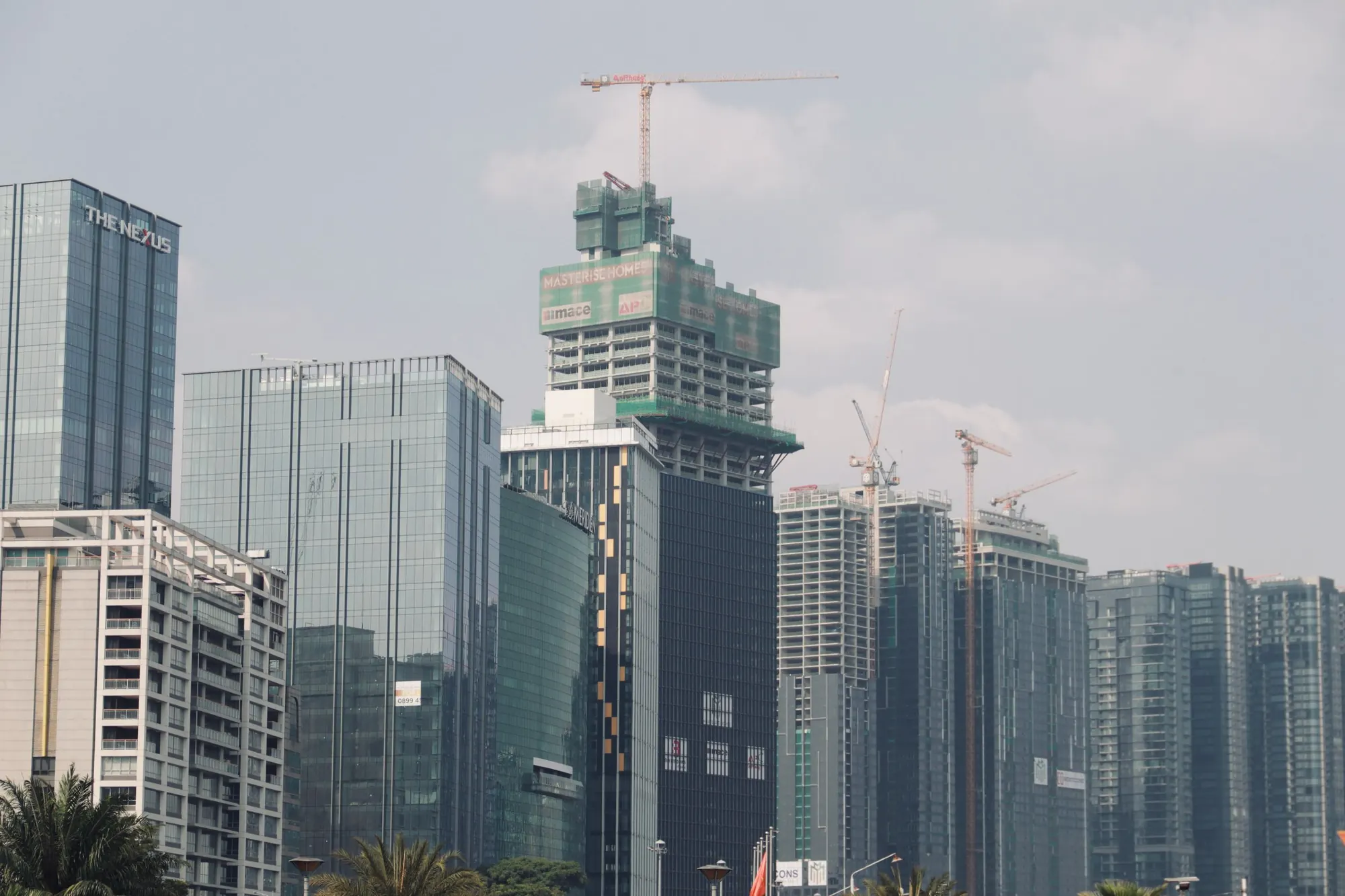 Cranes over towers under construction