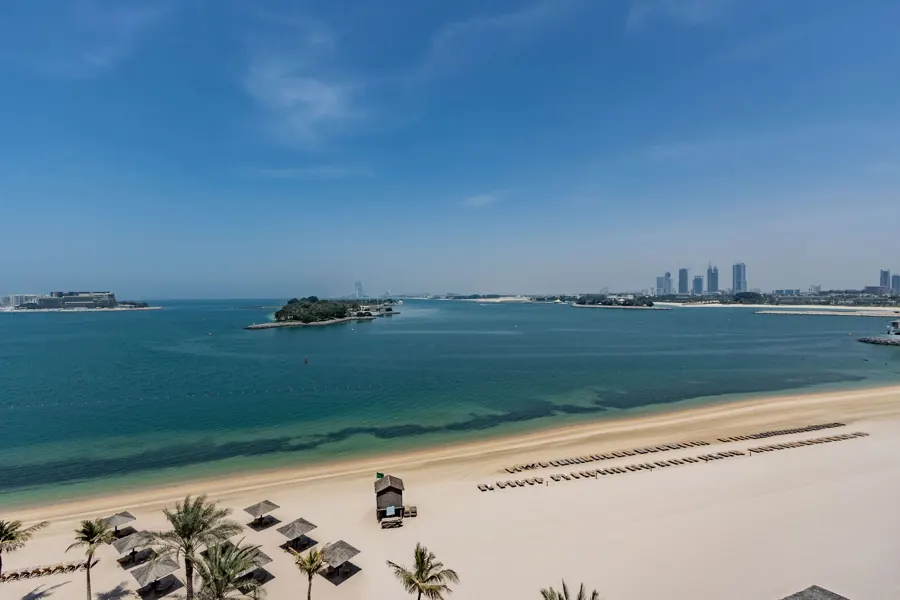 Palm Jumeirah beach with skyline